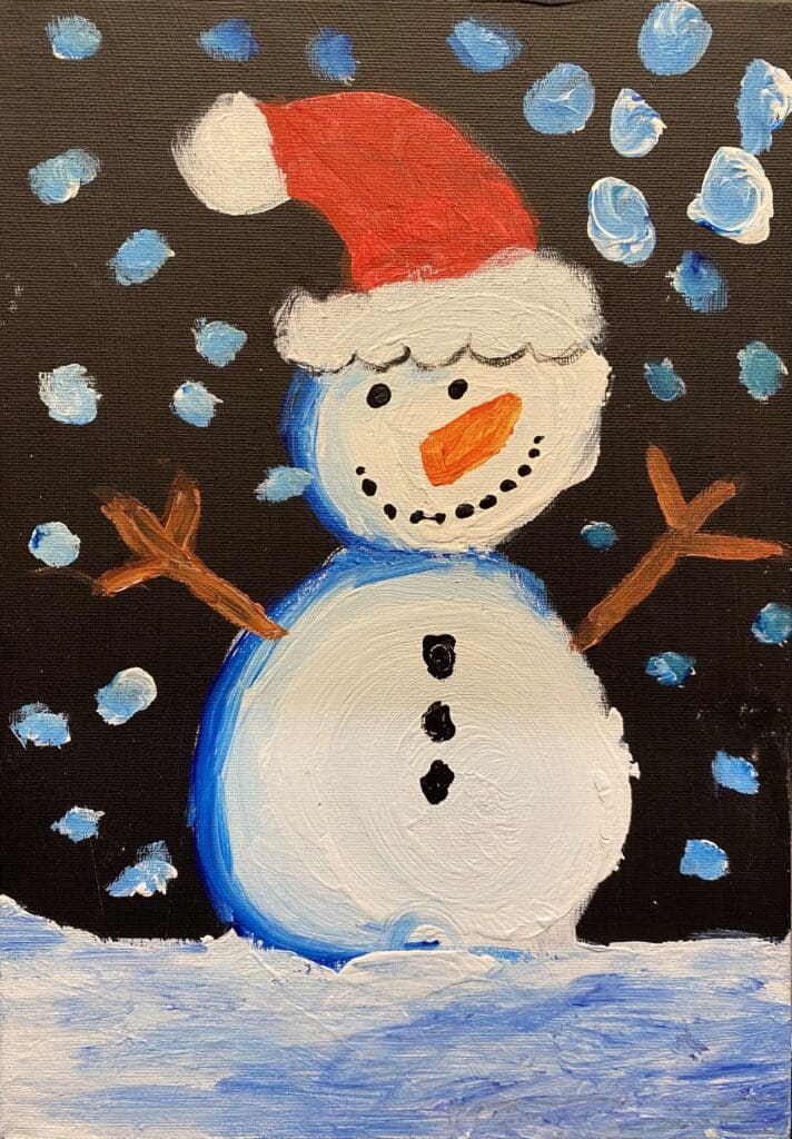 A lovely snowman design by Reigate schoolboy Felix, seven, is the winner of this year's Christmas card competition 